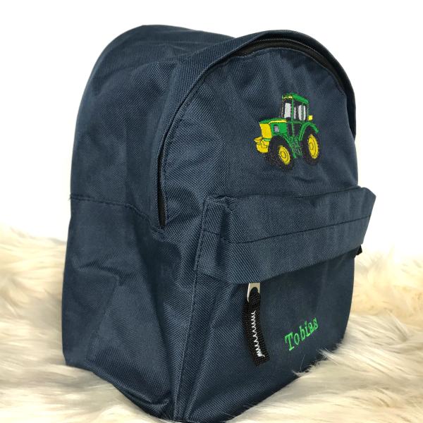 Preview: Kindergartenrucksack dunkelblau mit Traktor und Namen 